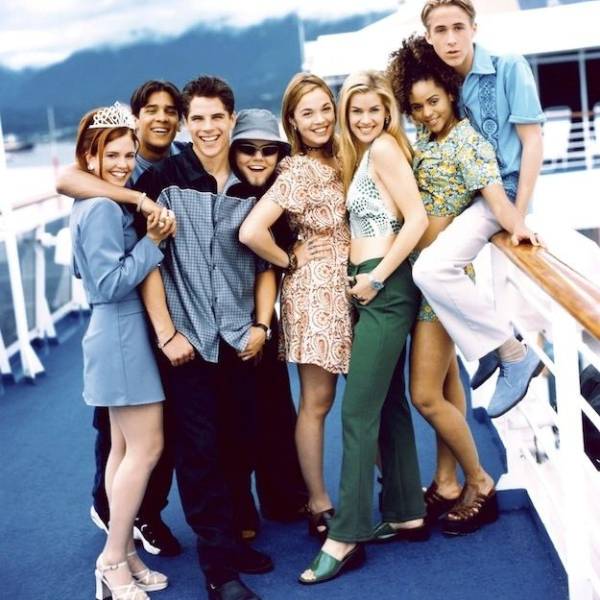 BREAKER HIGH Group of teenagers standing together on the deck of a boat